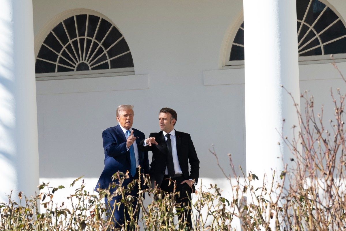 President Donald Trump walks along the West Colonnade with French President Emmanuel Macron, Monday, February 24, 2025.(Official White House Photo by Joyce N. Boghosian)