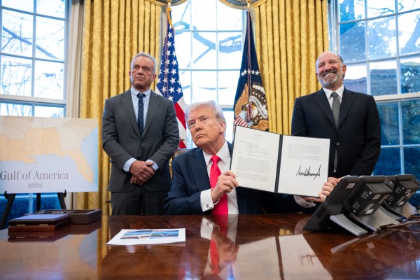 President Donald Trump signs executive orders in the Oval Office, Tuesday, February 25, 2025. (Official White House Photo by Molly Riley)