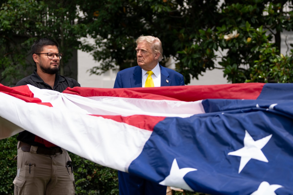 President Donald Trump watches the United States flag is raised on the newly installed flagpole on the South Lawn of the White House, Wednesday, June 18, 2025. (Official White House Photo by Andrea Hanks)