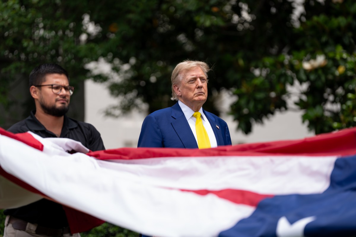 President Donald Trump watches the United States flag is raised on the newly installed flagpole on the South Lawn of the White House, Wednesday, June 18, 2025. (Official White House Photo by Andrea Hanks)