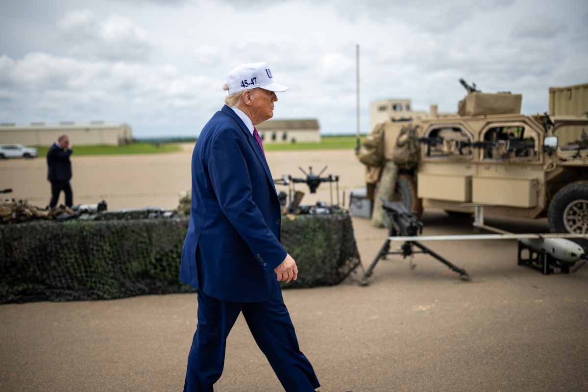 President Donald Trump walks by military equipment after disembarking Marine One before a military demonstration at Fort Bragg, North Carolina on Tuesday, June 10, 2025, during a visit to commemorate the 250th anniversary of the U.S. Army. (Official White House Photo by Daniel Torok)