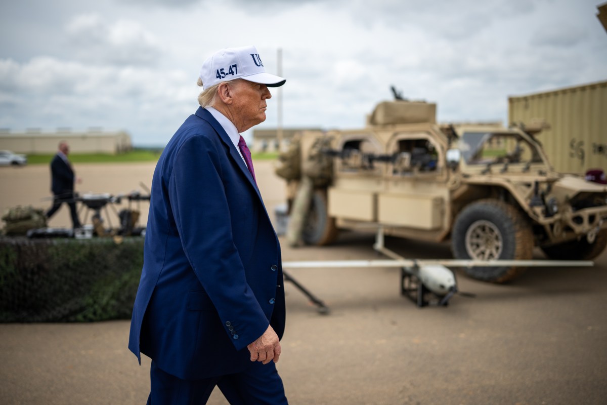 President Donald Trump walks by military equipment after disembarking Marine One before a military demonstration at Fort Bragg, North Carolina on Tuesday, June 10, 2025, during a visit to commemorate the 250th anniversary of the U.S. Army. (Official White House Photo by Daniel Torok)