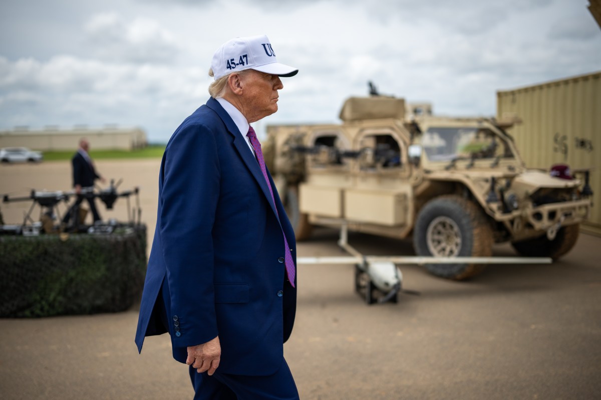 President Donald Trump walks by military equipment after disembarking Marine One before a military demonstration at Fort Bragg, North Carolina on Tuesday, June 10, 2025, during a visit to commemorate the 250th anniversary of the U.S. Army. (Official White House Photo by Daniel Torok)