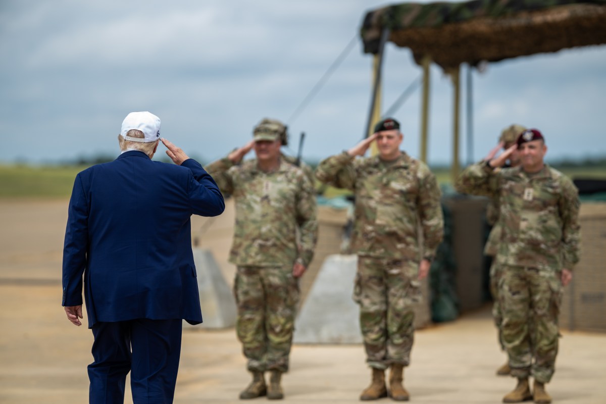 President Donald Trump speaks with members of the military before a military demonstration at Fort Bragg, North Carolina on Tuesday, June 10, 2025, during a visit to commemorate the 250th anniversary of the U.S. Army. (Official White House Photo by Daniel Torok)