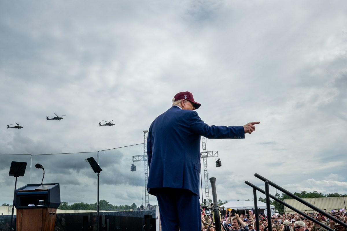 Military helicopters fly by as President Donald Trump begins his remarks at Fort Bragg, North Carolina on Tuesday, June 10, 2025, during a visit to commemorate the 250th anniversary of the U.S. Army. (Official White House Photo by Daniel Torok)