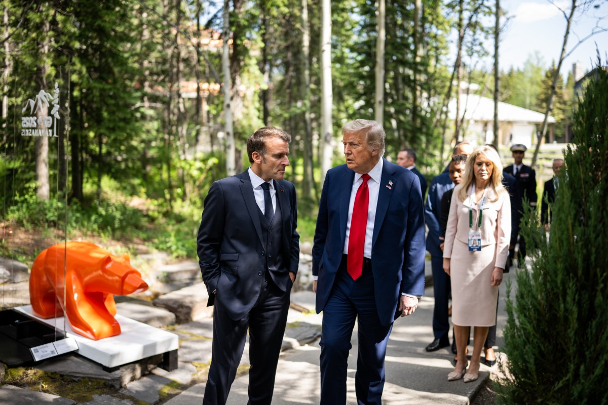President Donald Trump talks with French President Emmanuel Macron before a welcome ceremony at the G7 Summit, Monday, June 16, 2025, in Kananaskis, Alberta, Canada. (Official White House Photo by Daniel Torok)