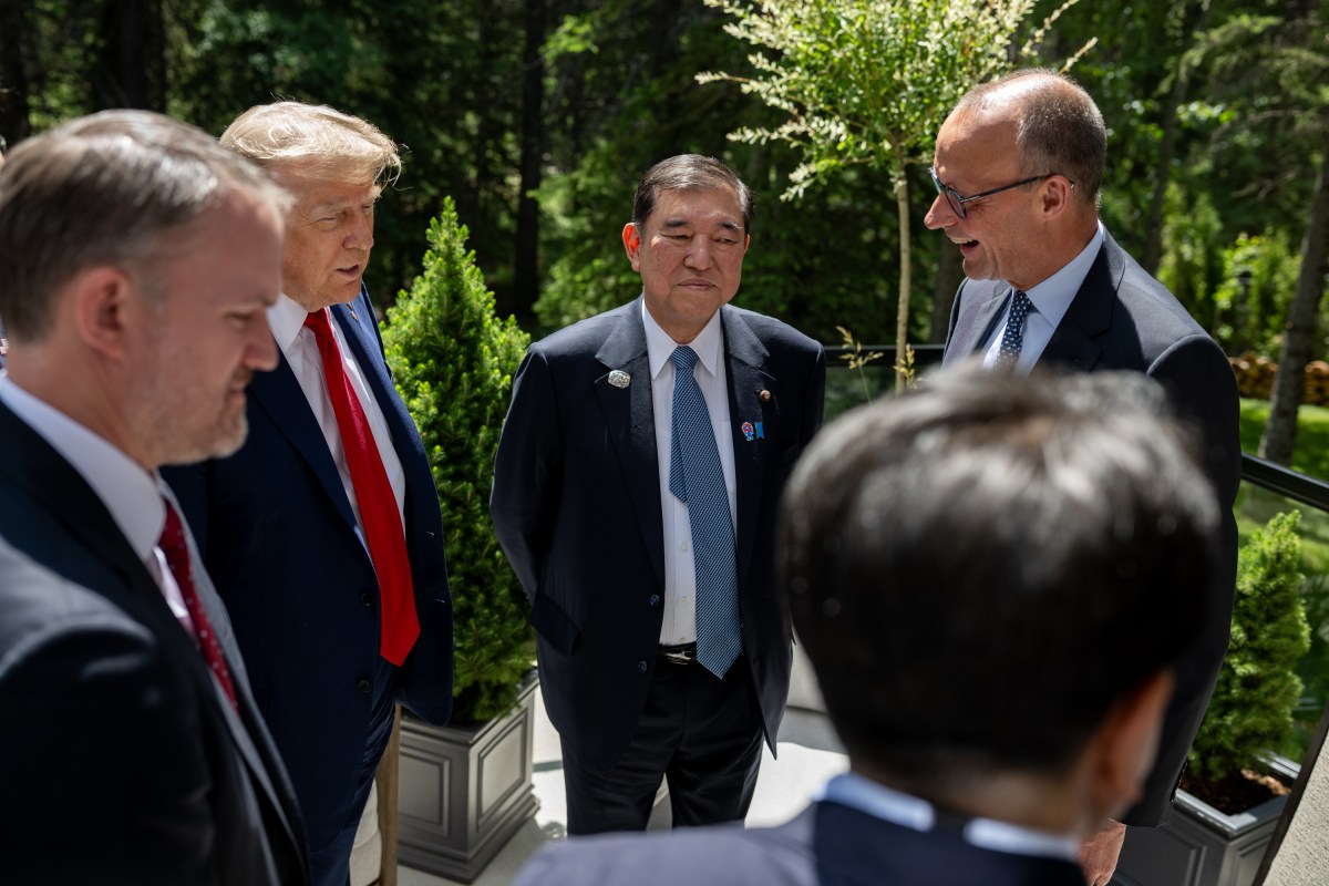 President Donald Trump speaks with Japanese Prime Minister Shigeru Ishiba and German Chancellor Friedrich Merz after Session I of the G7 Summit, Monday, June 16, 2025, in Kananaskis, Alberta, Canada. (Official White House Photo by Daniel Torok)
