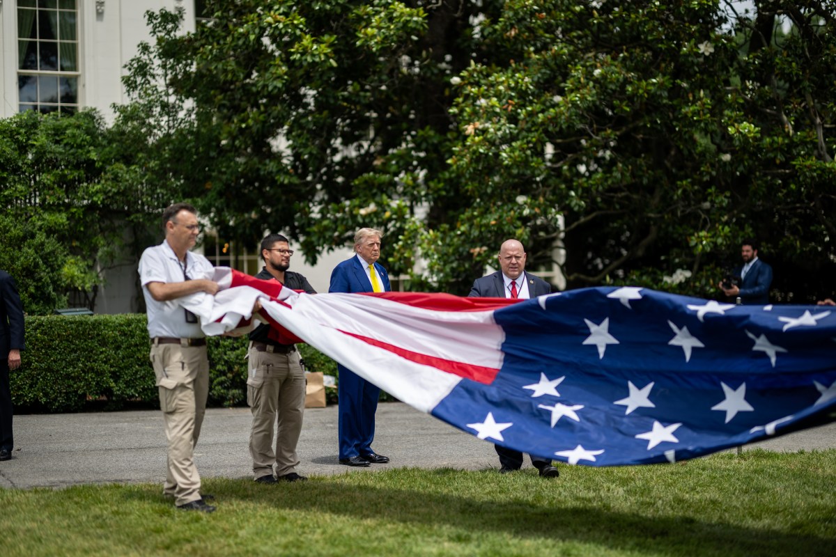 President Donald Trump watches as the American flag is raised on the newly-installed flagpole on the South Lawn of the White House, Wednesday, June 18, 2025. (Official White House Photo by Daniel Torok)