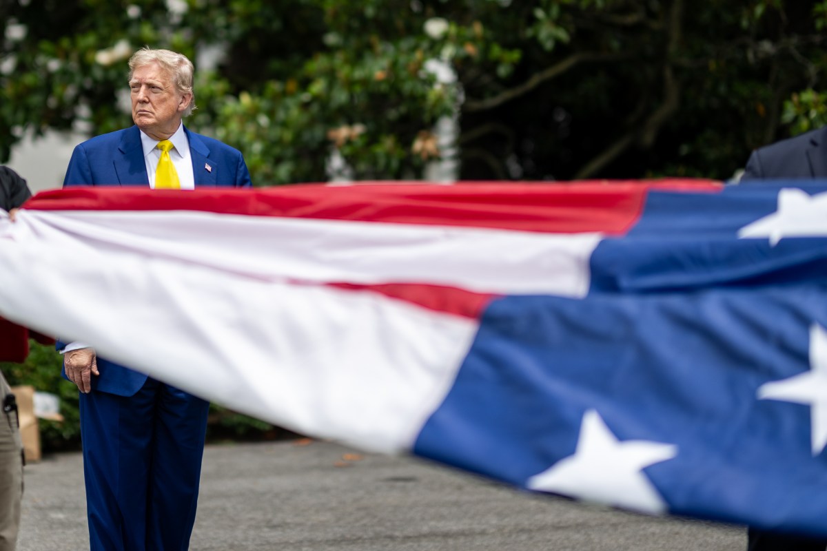 President Donald Trump watches as the American flag is raised on the newly-installed flagpole on the South Lawn of the White House, Wednesday, June 18, 2025. (Official White House Photo by Daniel Torok)
