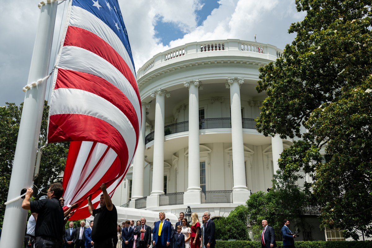 President Donald Trump watches as the American flag is raised on the newly-installed flagpole on the South Lawn of the White House, Wednesday, June 18, 2025. (Official White House Photo by Daniel Torok)