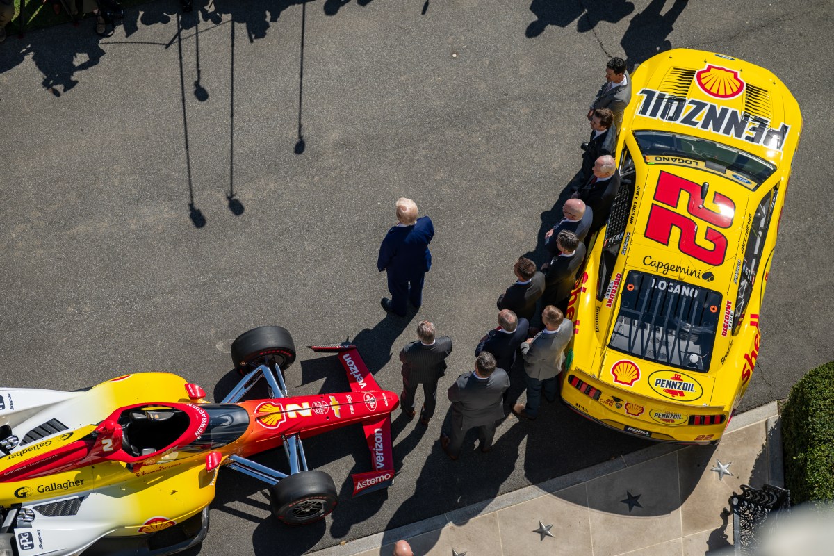 President Donald Trump participates in a photo opportunity with 2024 NASCAR Cup Series Champion Joey Logano and other racing champions, Wednesday, April 9, 2025, at the South Portico of the White House. (Official White House Photo by Molly Riley)