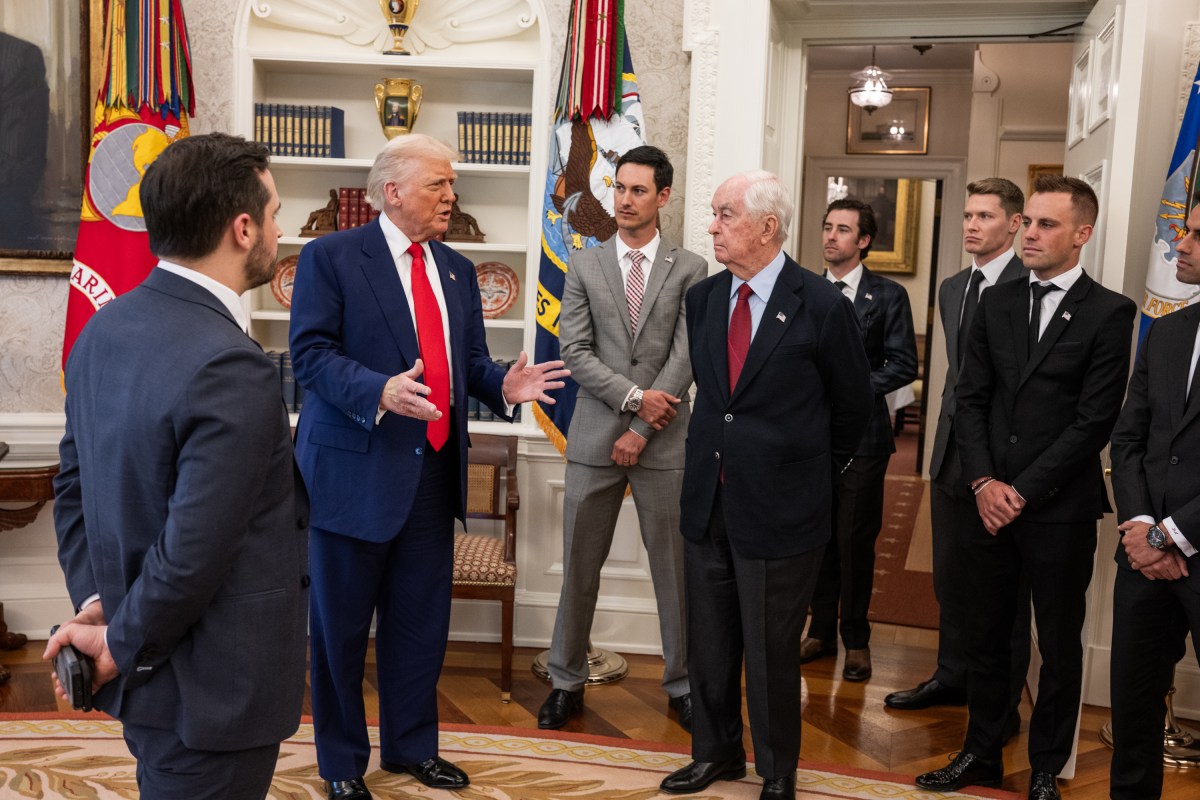 President Donald Trump participates in a photo opportunity with 2024 NASCAR Cup Series Champion Joey Logano and other racing champions, Wednesday, April 9, 2025, at the South Portico of the White House. (Official White House Photo by Daniel Torok)