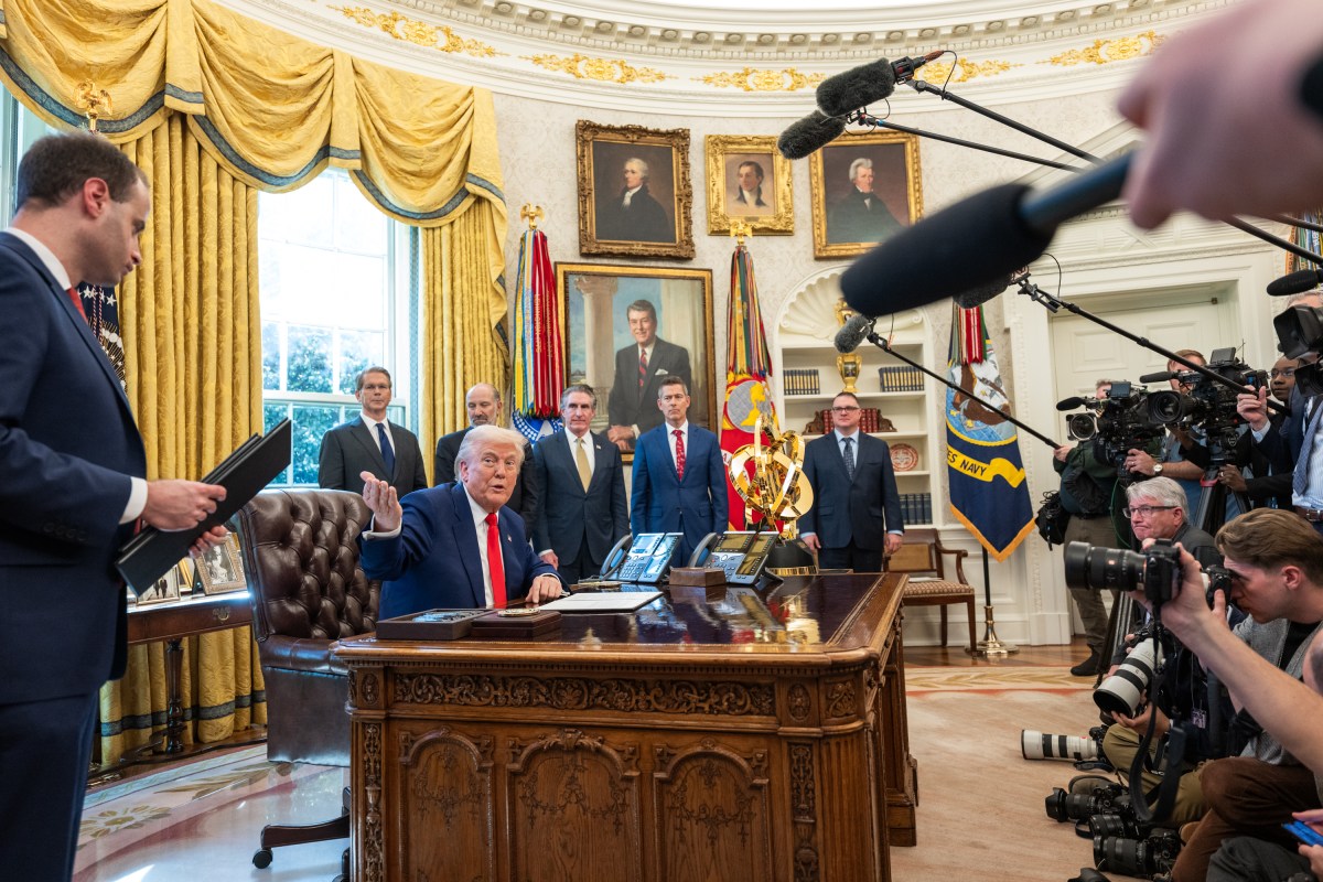 President Donald Trump signs Executive Orders, Wednesday, April 9, 2025, in the Oval Office. (Official White House Photo by Joyce N. Boghosian)