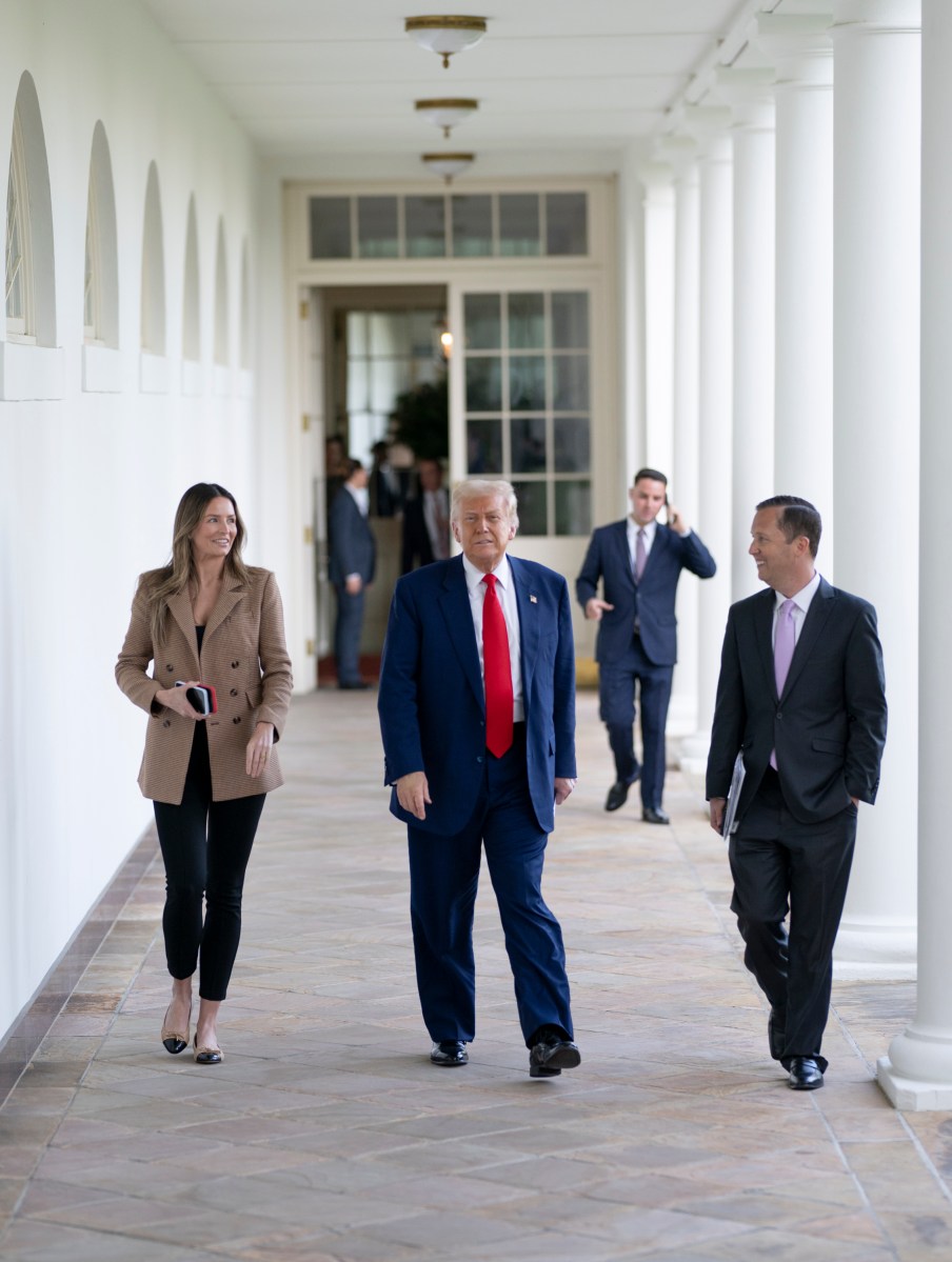 President Donald Trump walks along the West Colonnade to the Oval Office, Wednesday, April 9, 2025, after greeting the North Dakota State University Bison football team. (Official White House Photo by Molly Riley)