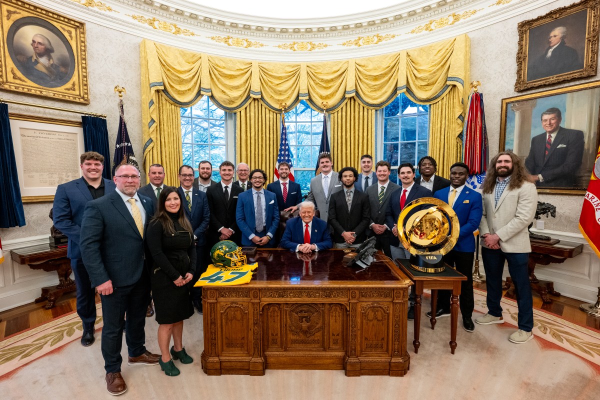 President Donald Trump poses for a photo with the North Dakota State University Bison football team, Wednesday, April 9, 2025, in the East Room of the White House. (Official White House Photo by Molly Roberts)