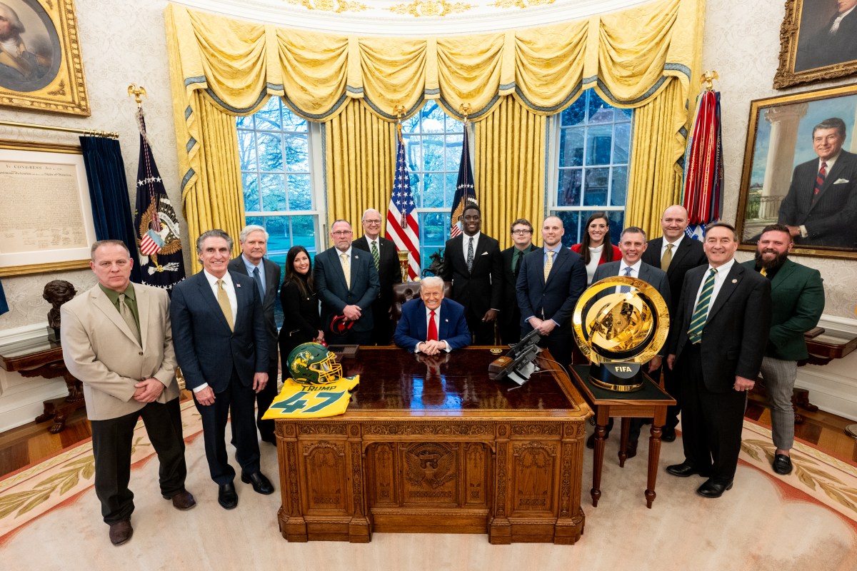 President Donald Trump poses for a photo with the North Dakota State University Bison football team, Wednesday, April 9, 2025, in the East Room of the White House. (Official White House Photo by Molly Roberts)