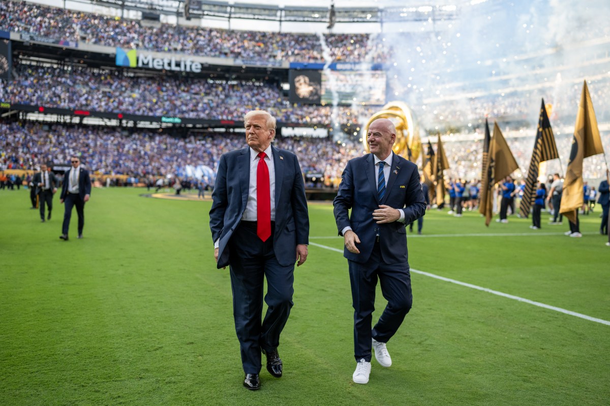 President Donald Trump gestures to the crowd as he departs the FIFA World Cup Final alongside FIFA President Gianni Infantino, Sunday, July 13, 2025, at MetLife Stadium in East Rutherford, New Jersey. (Official White House Photo by Daniel Torok)