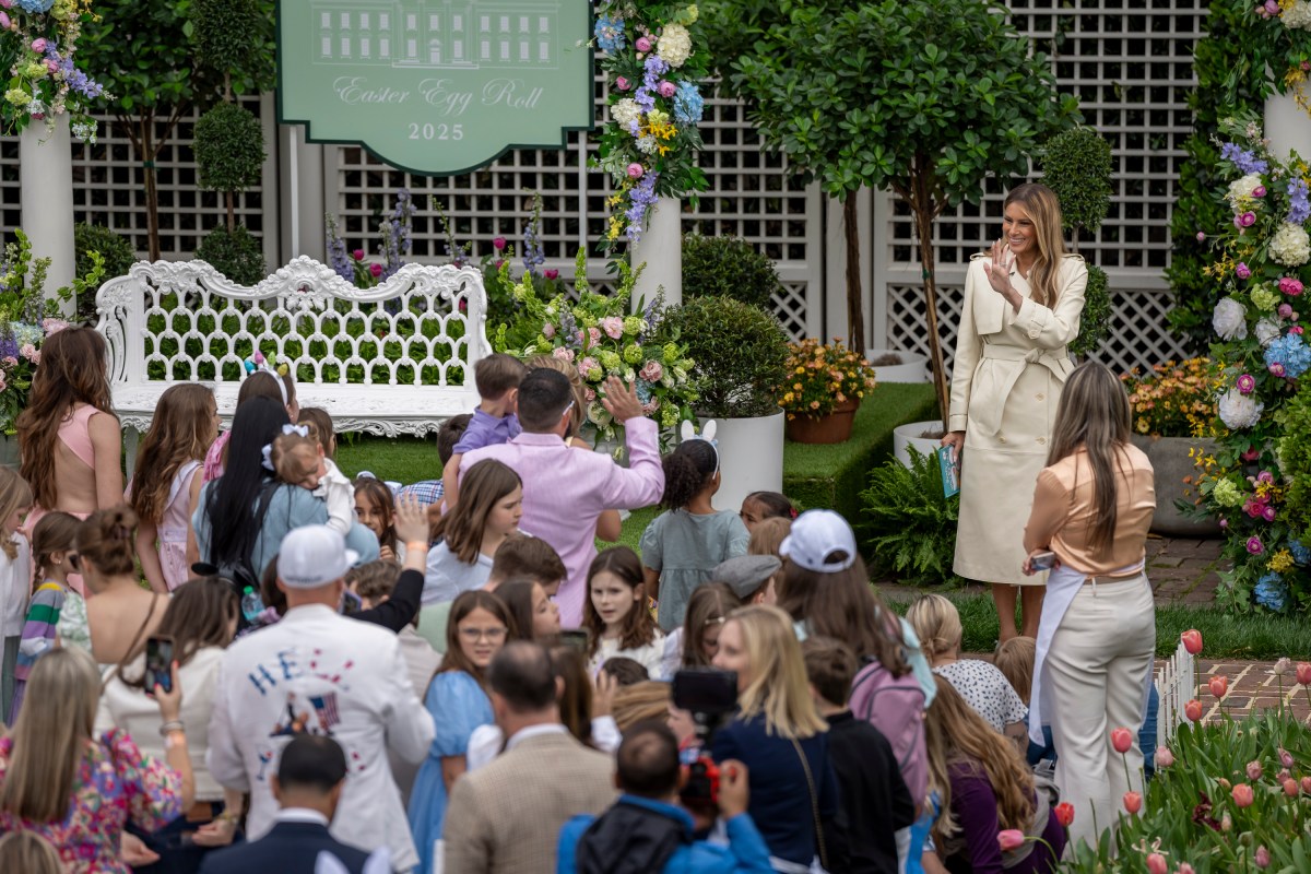 First Lady Melania Trump reads a book at the Reading Nook in the First Ladies Garden during the White House Easter Egg Roll, Monday, April 21, 2025, on the South Lawn.(Official White House Photo by Carlos Fyfe)