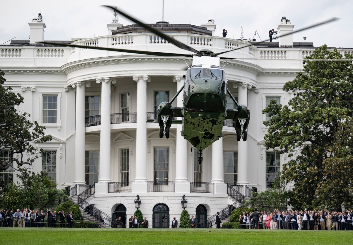 President Donald Trump boards Marine One on the South Lawn of the White House, Thursday, May 1, 2025, en route to Joint Base Andrews for a trip to Alabama. (Official White House Photo by Molly Riley)