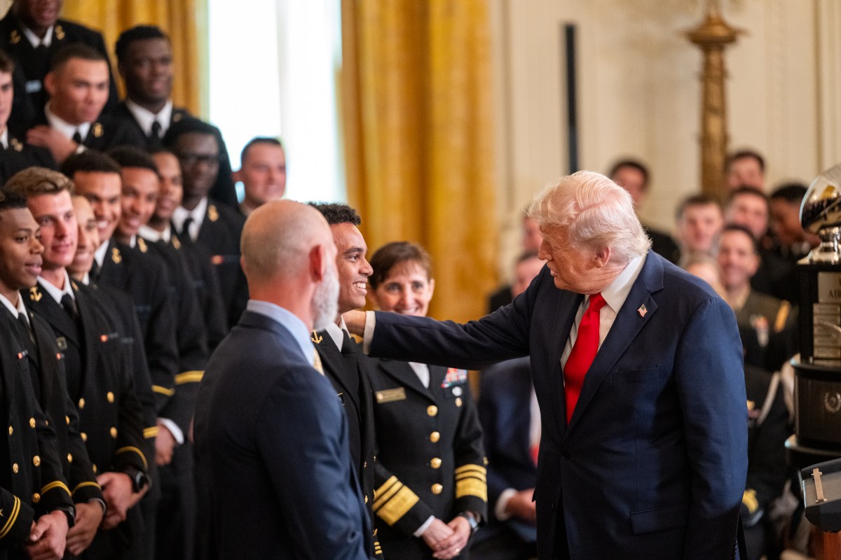 President Donald Trump greets members of the Navy Midshipmen football team from the U.S. Naval Academy, Tuesday, April 15, 2025, in the State Dining Room of the White House. (Official White House Photo by Molly Riley)