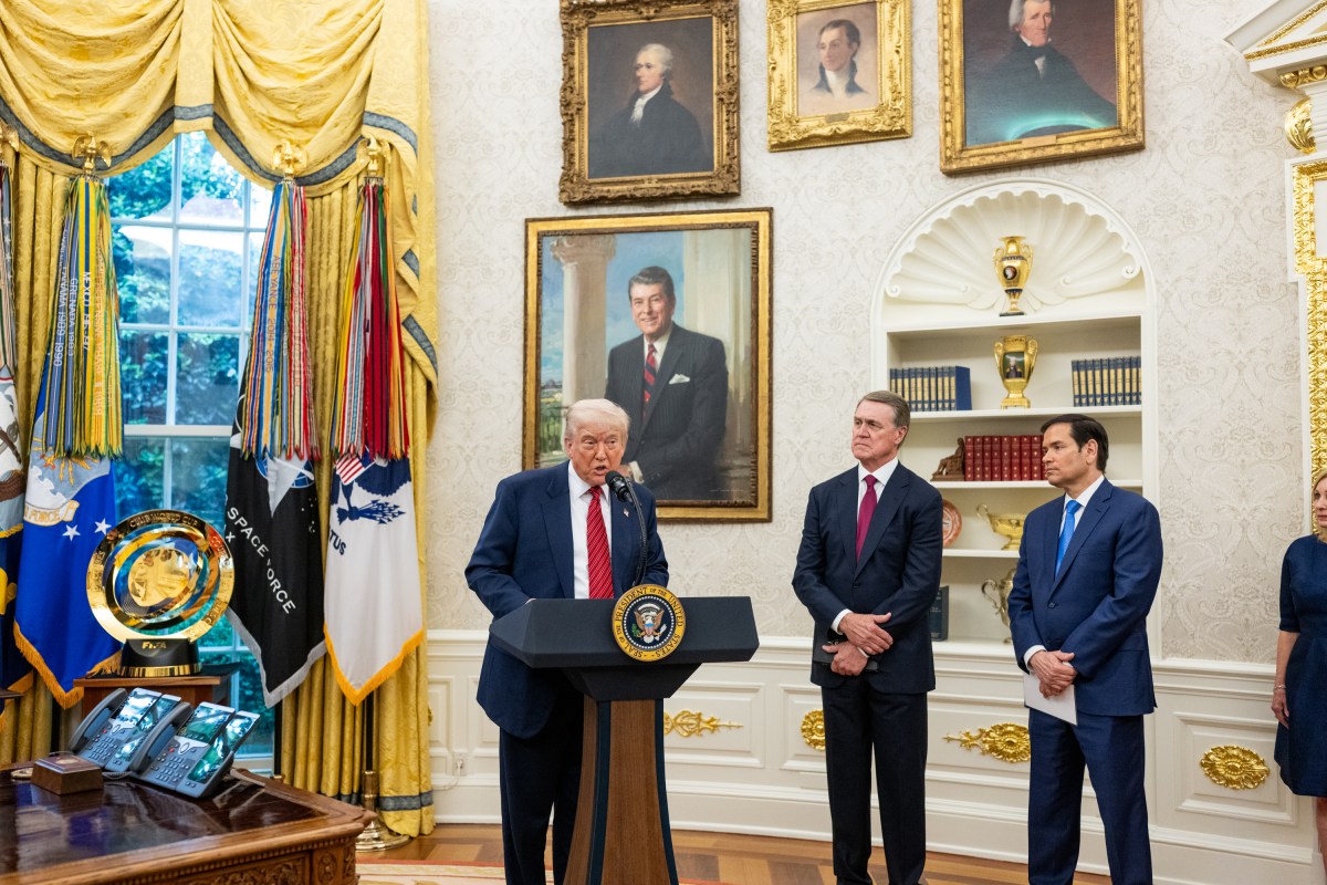 President Donald Trump participates in the swearing-in ceremony for U.S. Ambassador to China David Purdue, Wednesday, May 7, 2025, in the Oval Office. (Official White House Photo by Molly Riley)