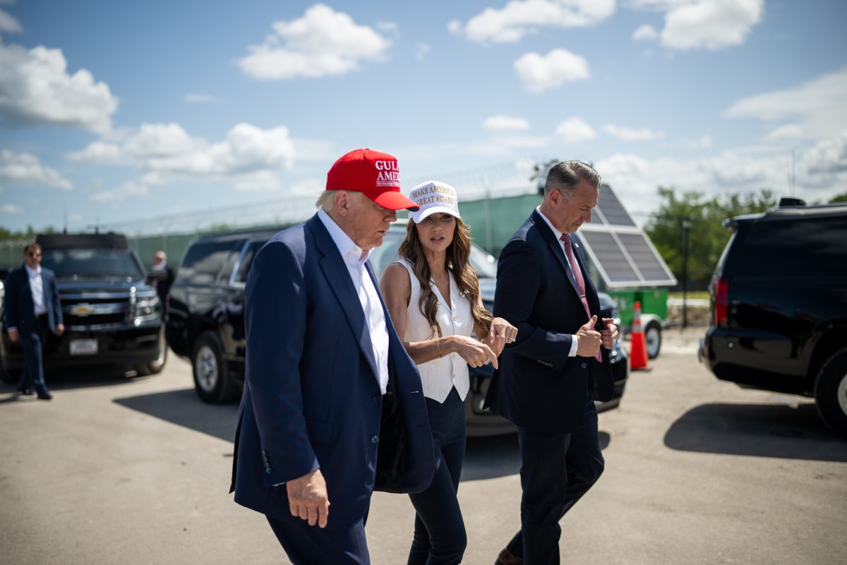President Donald Trump speaks with Secretary of Homeland Security Kristi Noem during a walking tour of the immigration detention center nicknamed “Alligator Alcatraz”, Tuesday, July 1, 2025, in Ochopee, Florida. (Official White House Photo by Daniel Torok)