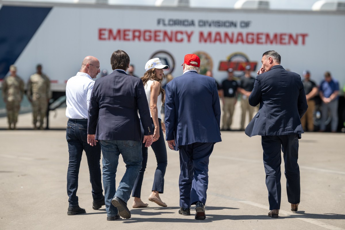 President Donald Trump speaks with Secretary of Homeland Security Kristi Noem during a walking tour of the immigration detention center nicknamed “Alligator Alcatraz”, Tuesday, July 1, 2025, in Ochopee, Florida. (Official White House Photo by Daniel Torok)