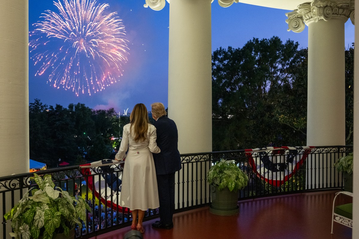 President Donald Trump and First Lady Melanie Trump view a 4th of July fireworks display over the National Mall from the Blue Room Balcony, Friday, July 4, 2025. (Official White House Photo by Daniel Torok)