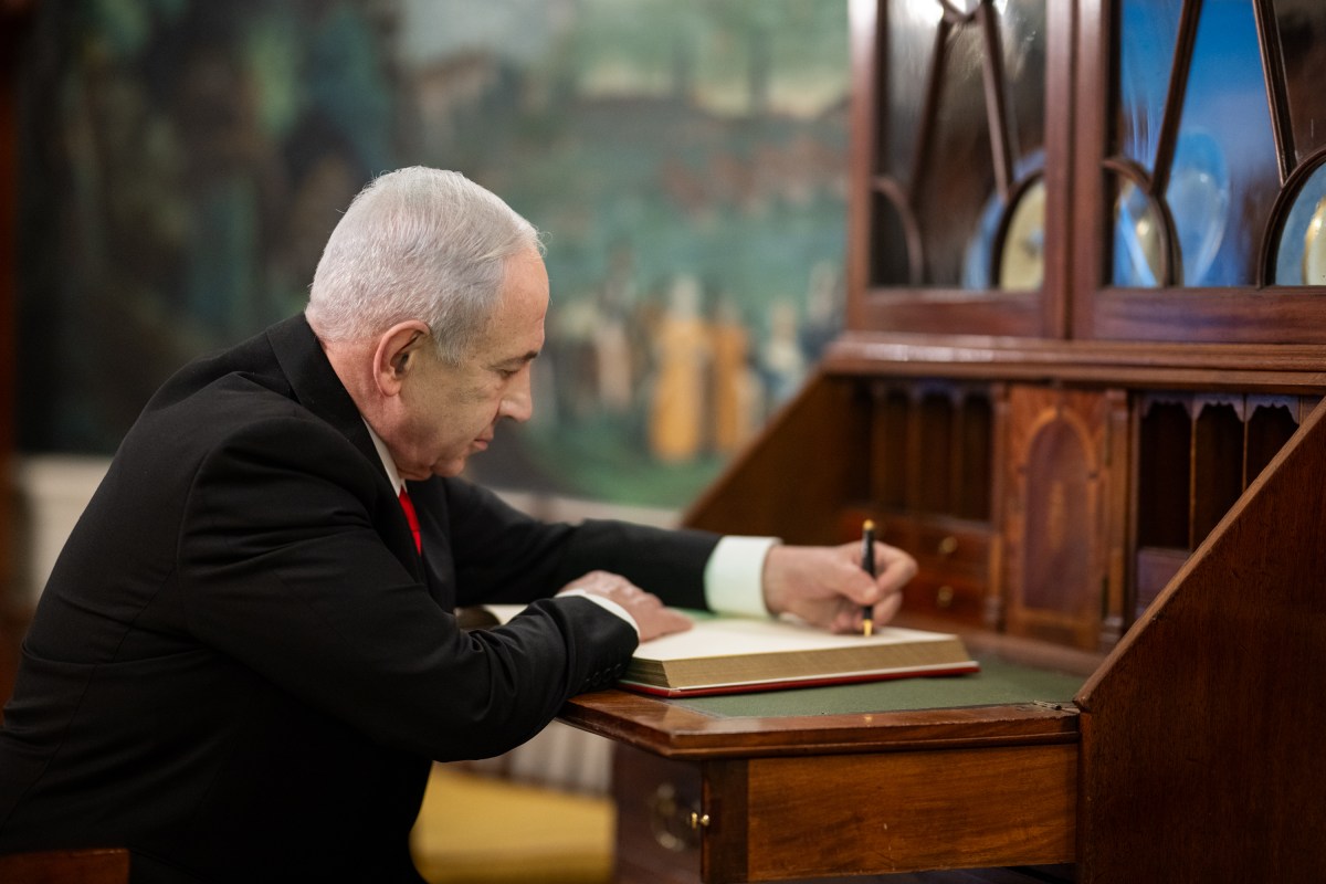 Israeli Prime Minister Benjamin Netanyahu signs the guest book in the White House, Monday, July 7, 2025. (Official White House Photo by Daniel Torok)