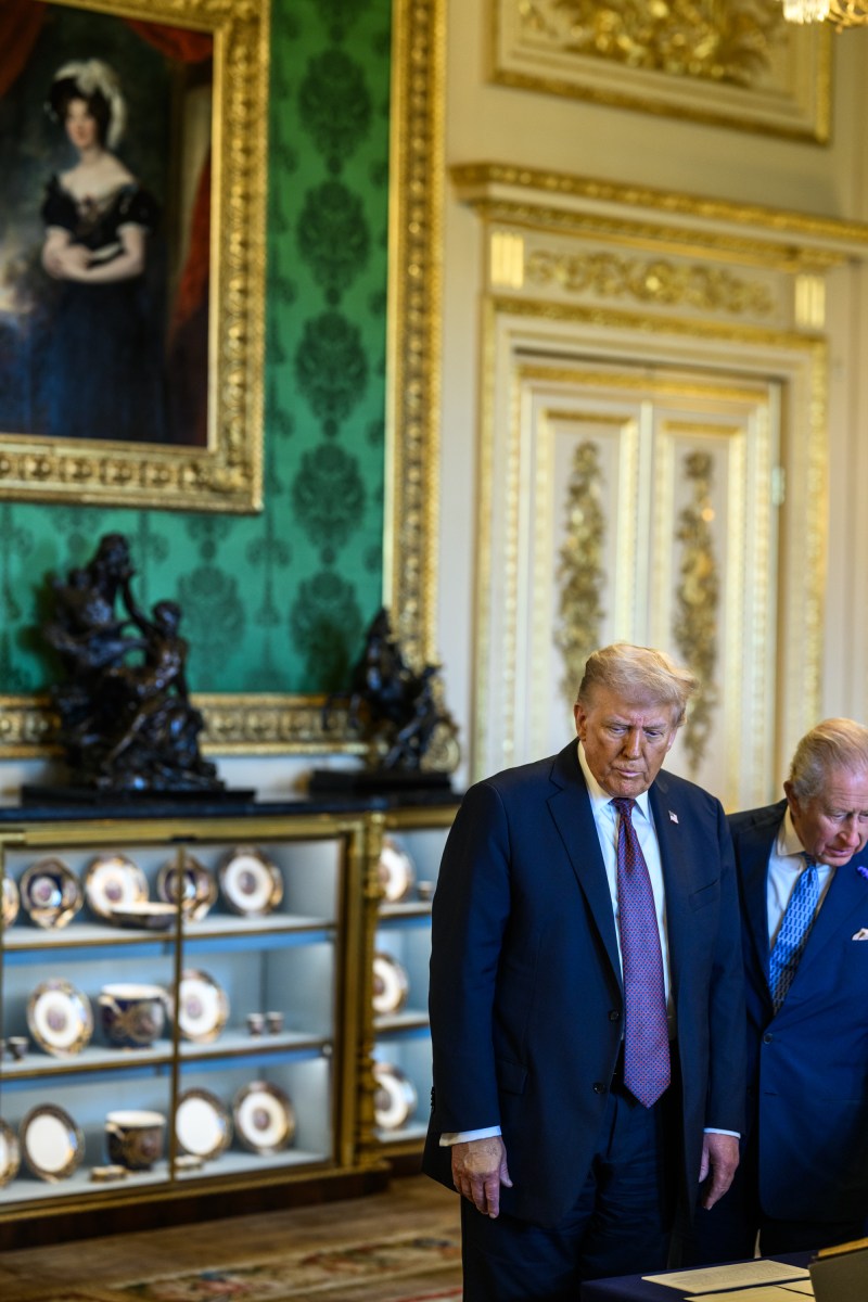 President Donald Trump and First Lady Melania Trump view a collection of American-related items from the royal collection with King Charles III and Queen Camilla in the Green Drawing Room at Windsor Castle in Windsor, England on Wednesday, September 17, 2025. (Official White House Photo by Daniel Torok)
