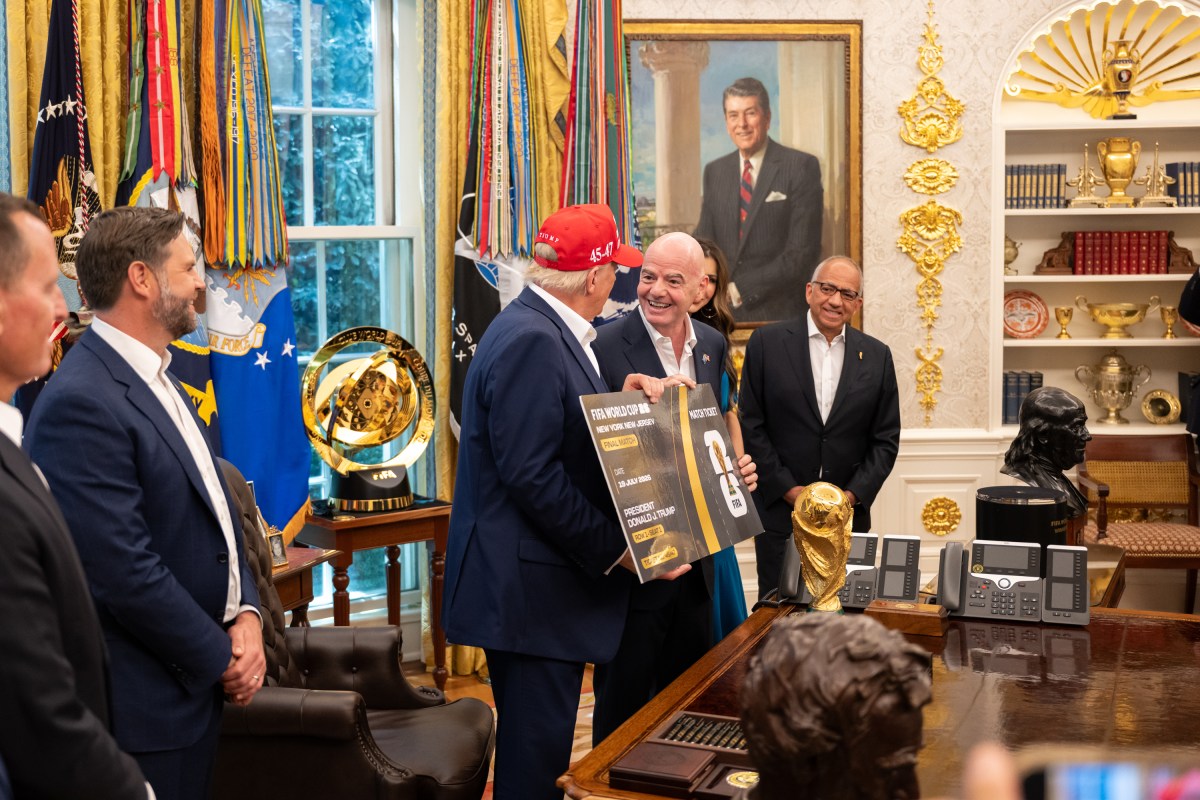 President Donald Trump, flanked by Vice President JD Vance and FIFA President Gianni Infantino, announces that the FIFA World Cup draw will take place on December 5 at the Kennedy Center, Friday, August 22, 2025. (Official White House Photo by Joyce N. Boghosian)