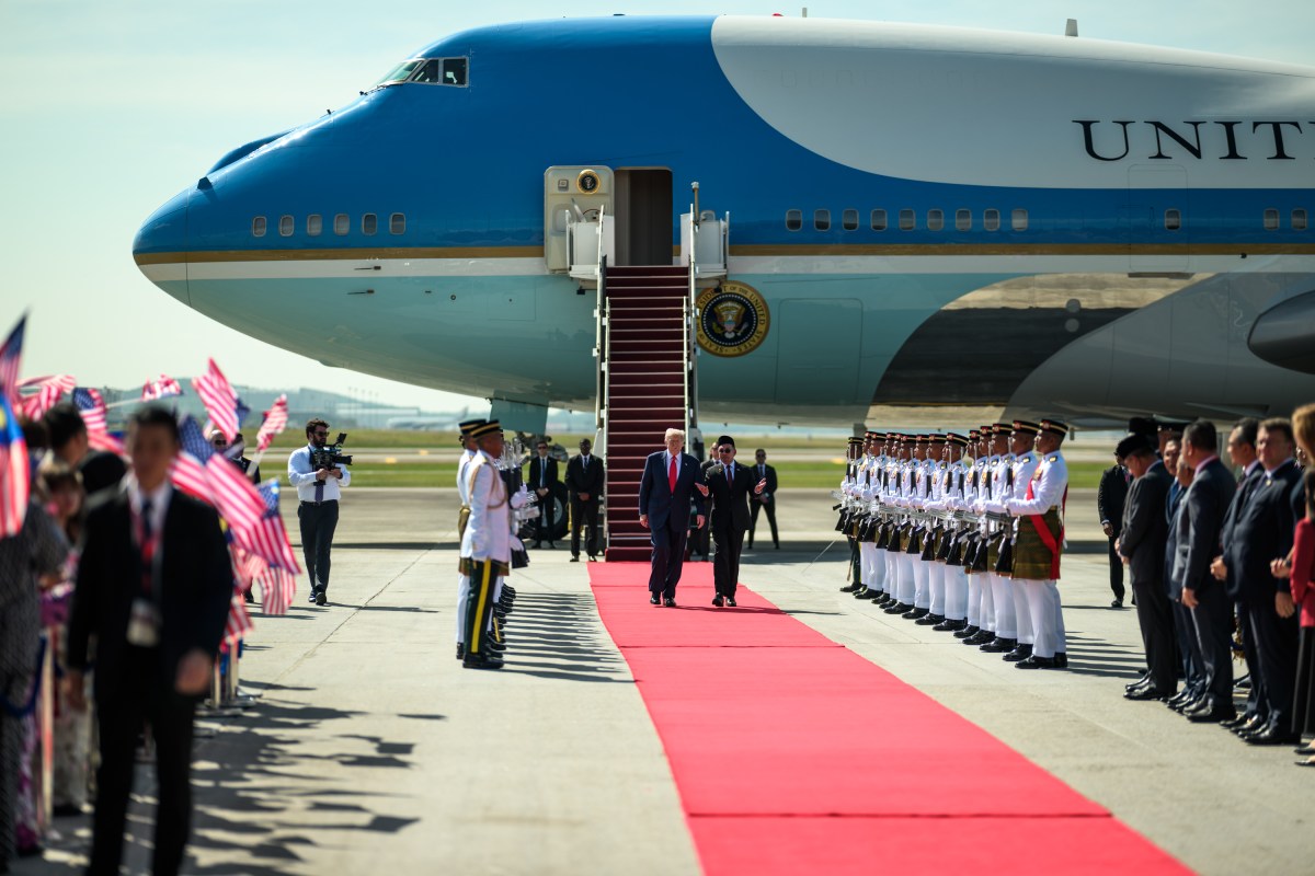 President Donald Trump is greeted by Malaysian Prime Minister Anwar Ibrahim after his arrival at Kuala Lumpur International Airport in Kuala Lumpur, Malaysia, Sunday, October 25, 2025. (Official White House Photo by Daniel Torok)