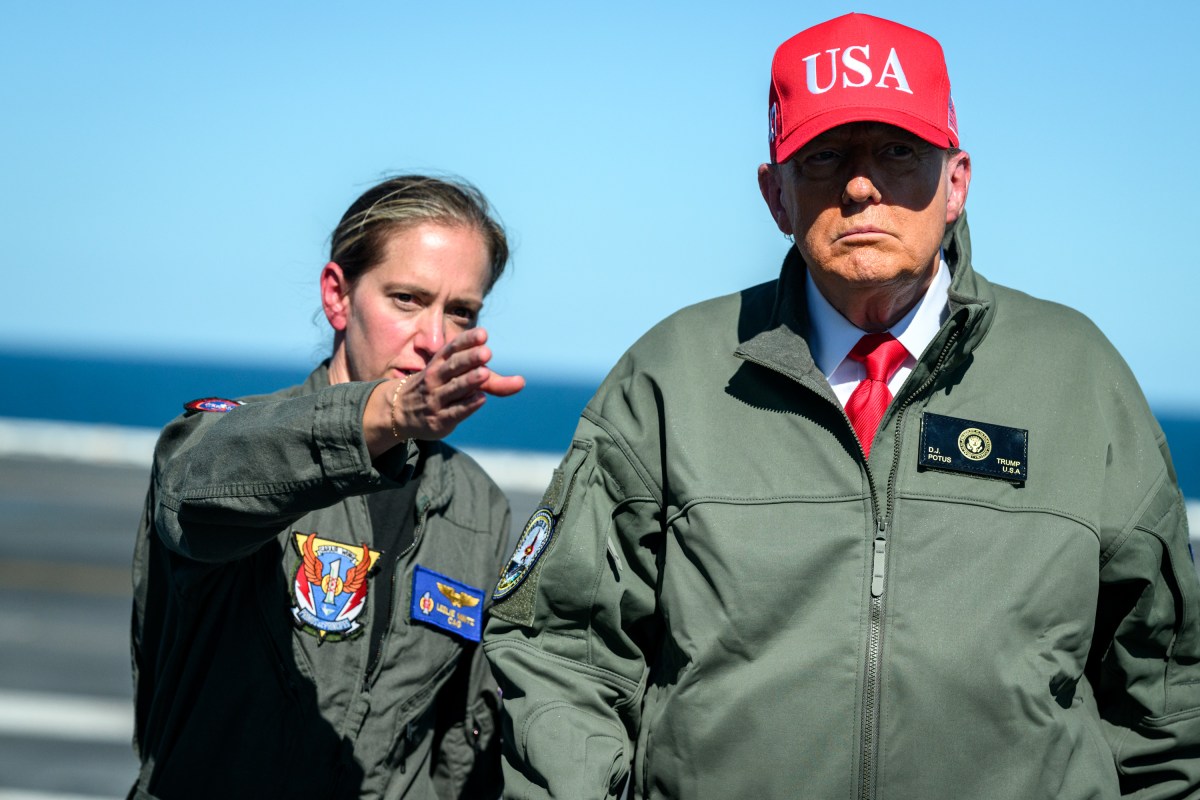 President Donald Trump and First Lady Melania Trump speak to sailors after a naval sea power demonstration, Sunday, October 5, 2025, aboard the USS George H.W. Bush in the Atlantic Ocean off the coast of Norfolk, Virginia. (Official White House Photo by Daniel Torok)