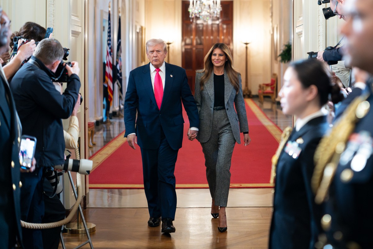 President Donald Trump and First Lady Melania Trump arrive to the East Room for an event on foster care, Thursday, November 13, 2025, at the White House. (Official White House Photo by Andrea Hanks)