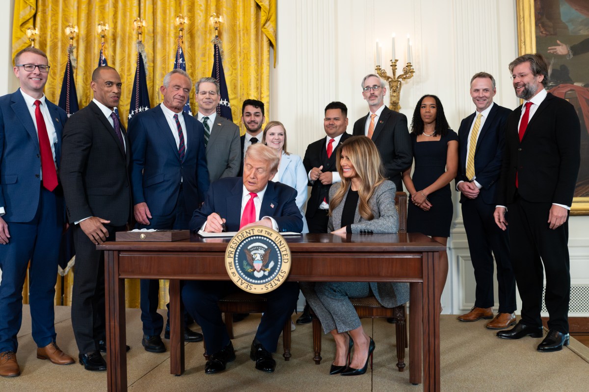 President Donald Trump signs a “Fostering the Future” executive order on foster care, Thursday, November 13, 2025, in the East Room of the White House. (Official White House Photo by Andrea Hanks)