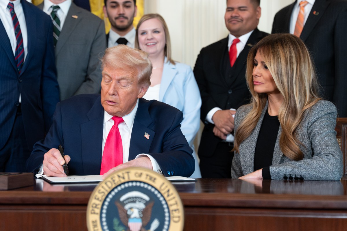 President Donald Trump signs a “Fostering the Future” executive order on foster care, Thursday, November 13, 2025, in the East Room of the White House. (Official White House Photo by Andrea Hanks)