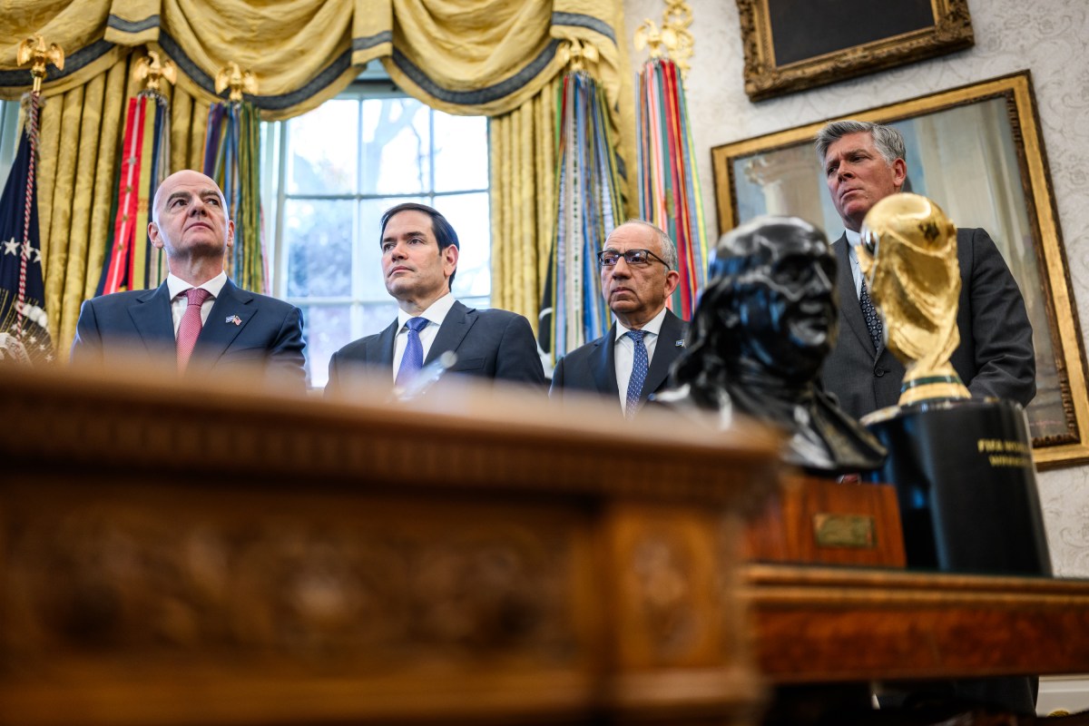 FIFA President Gianni Infantino, Secretary of State Marco Rubio, FIFA senior adviser Carlos Cordeiro, and Rep. Darin LaHood (R-IL) listen as President Donald Trump answers questions from the media after meeting with the White House Task Force on the 2026 FIFA World Cup, Monday, November 17, 2025, in the Oval Office. (Official White House Photo by Daniel Torok)