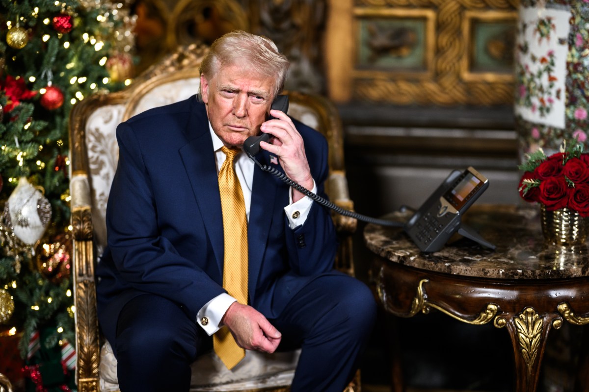 President Donald Trump and First Lady Melania Trump make NORAD Santa tracker calls from Mar-a-Lago in Palm Beach, Florida, Wednesday, December 24, 2025. (Official White House Photo by Daniel Torok)