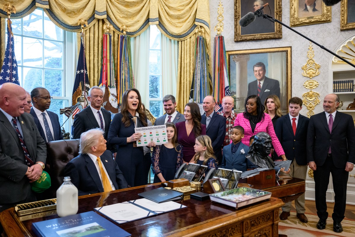 President Donald Trump signs Executive Orders including the “Whole Milk for Healthy Kids Act" alongside HHS Secretary Robert F. Kennedy, Jr., Secretary of Agriculture Brooke Rollins, and dairy farmers in the Oval Office, Wednesday, January 14, 2026. (Official White House Photo by Joyce N. Boghosian)