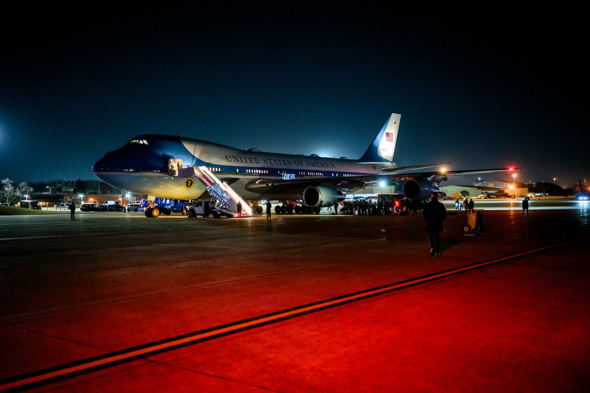 President Donald Trump disembarks Air Force One at Joint Base Andrews to board a backup plane to Davos, Switzerland, after Air Force One experienced electrical issues, Tuesday, January 20, 2026. (Official White House Photo by Daniel Torok)