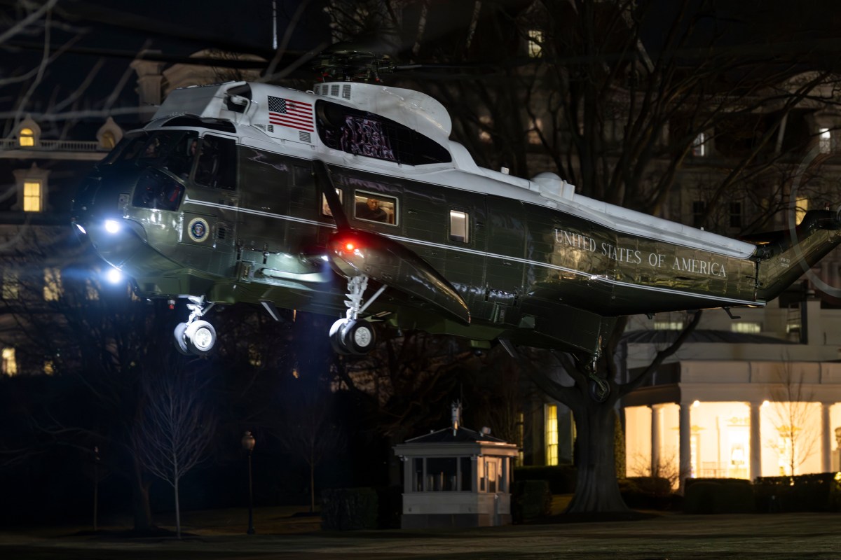 President Donald Trump boards Marine One on the South Lawn of the White House, Tuesday, January 20, 2026, en route to Joint Base Andrews, Maryland for his trip to the World Economic Forum in Davos, Switzerland. (Official White House Photo by Molly Riley)