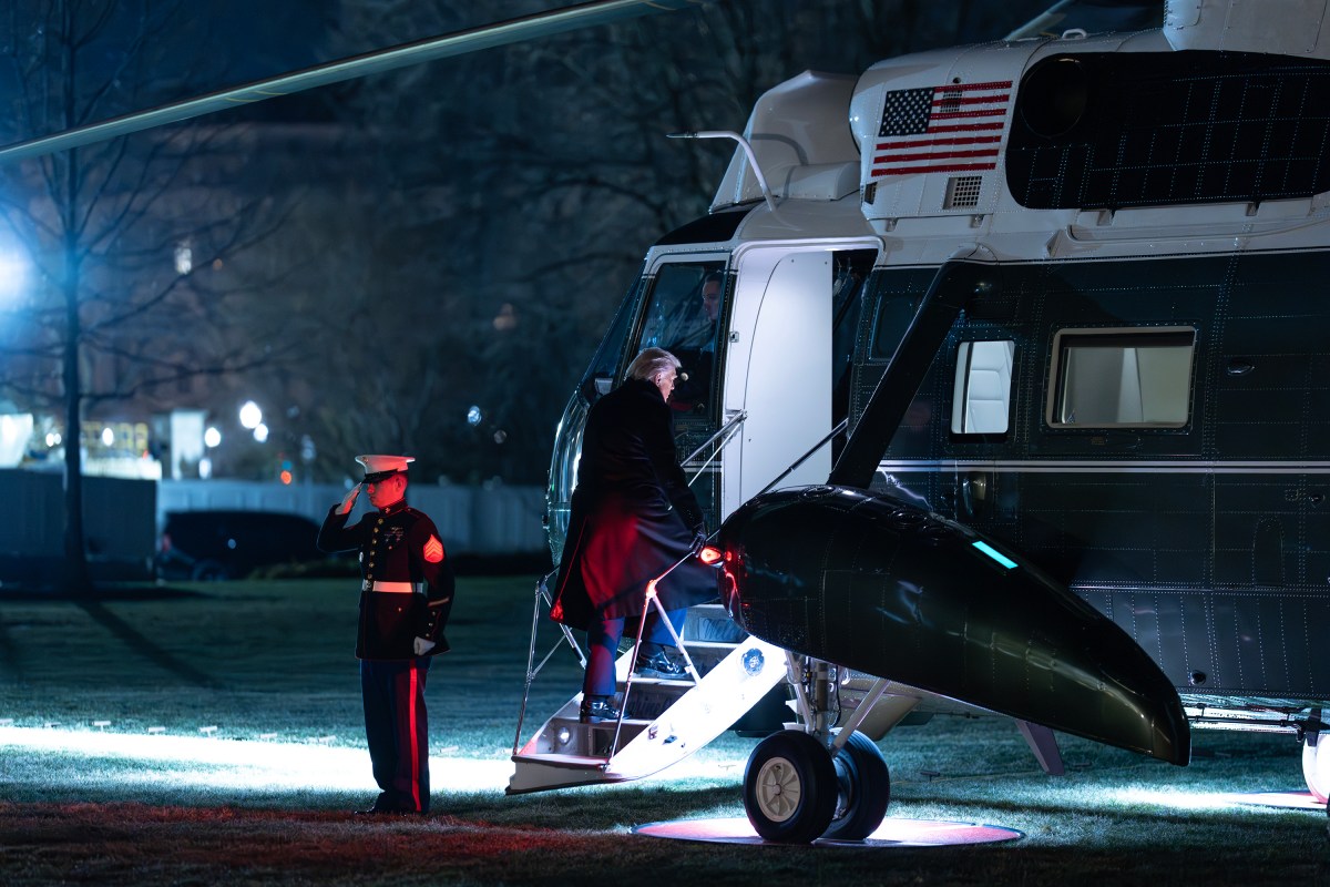 President Donald Trump boards Marine One on the South Lawn of the White House, Tuesday, January 20, 2026, en route to Joint Base Andrews, Maryland for his trip to the World Economic Forum in Davos, Switzerland. (Official White House Photo by Patrick B. Ruddy)