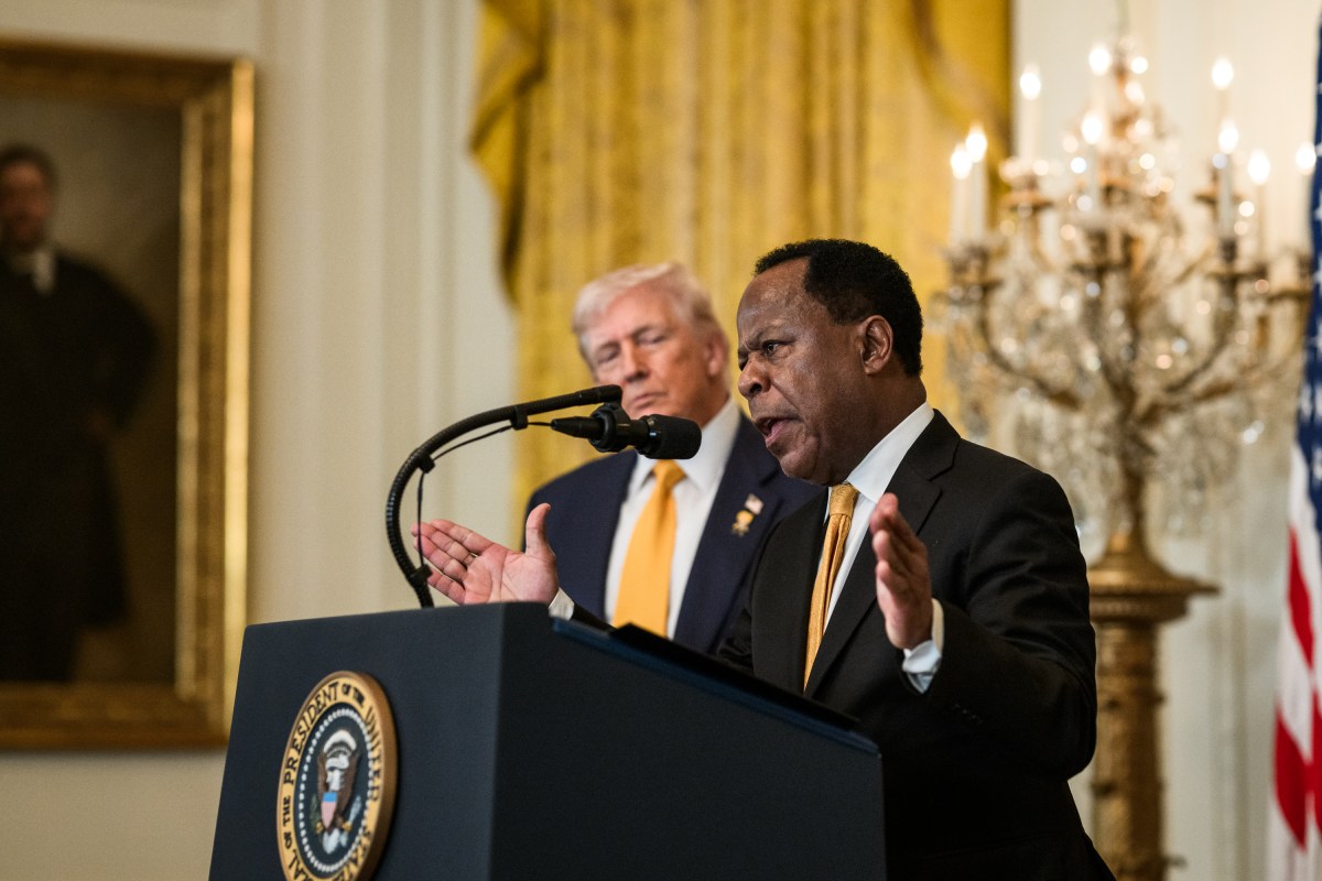 President Donald Trump looks on as Leo Terrell delivers remarks at a Black History Month reception, Wednesday, February 18, 2026, in the East Room of the White House. (Official White House Photo by Joyce N. Boghosian)