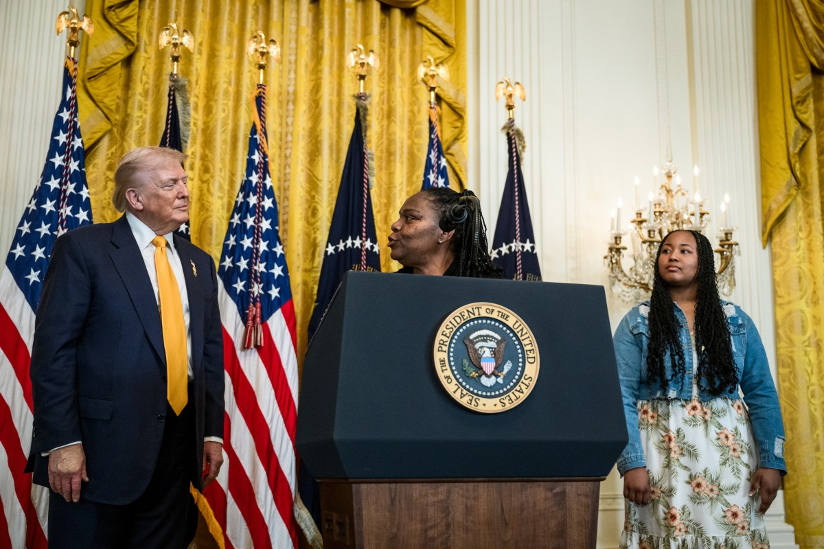 President Donald Trump looks on as Greta Alexander delivers remarks at a Black History Month reception, Wednesday, February 18, 2026, in the East Room of the White House. (Official White House Photo by Joyce N. Boghosian)