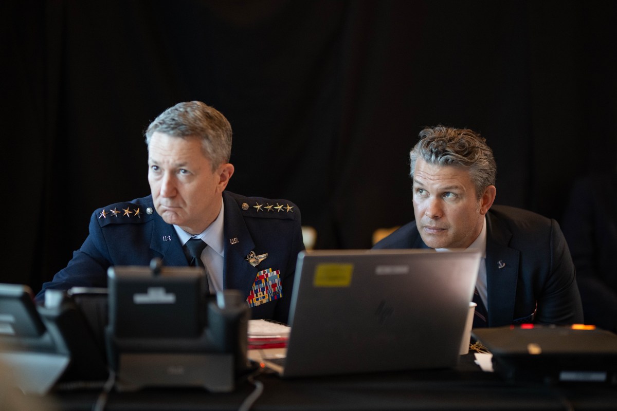 General Dan Caine and Secretary of War Pete Hegseth listen as President Donald J. Trump oversees Operation Epic Fury at Mar-a-Lago, Palm Beach, FL, March 1, 2026. (White House photo by Daniel Torok)